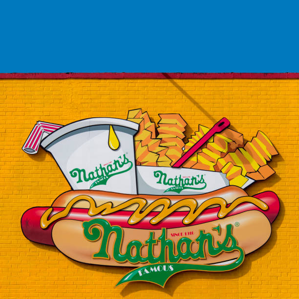 The Nathan's famous restaurant at Stillwell Avenue and Surf Avenue, Coney Island. The hot dog and burger restaurant still exists on the same location since 1916.