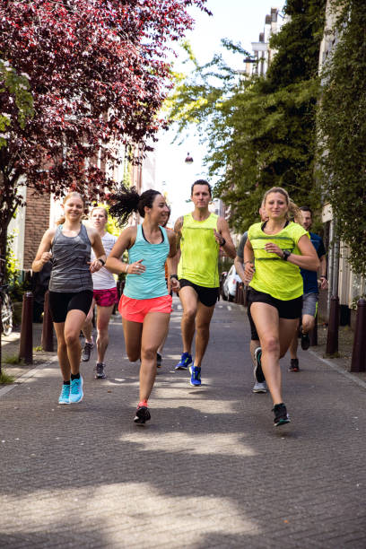 istock Urban runners crew training in the city 936082046