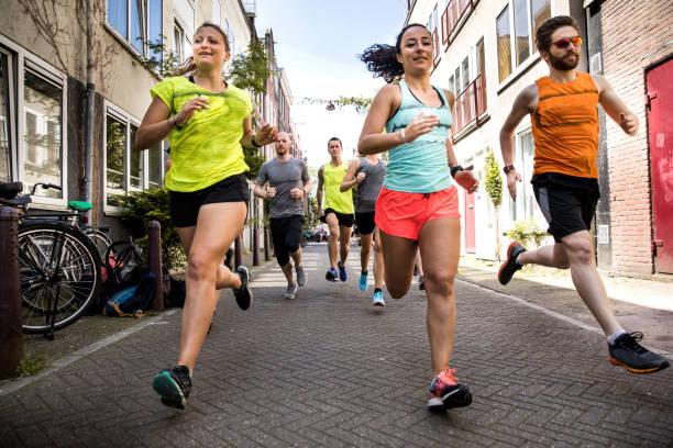 istock Urban runners crew training in the city 936082060