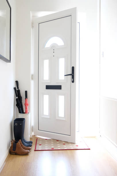 istock Half open front door of a house in England 936082700
