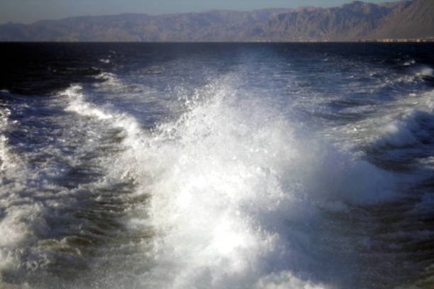 istock splashes of waves from the motor 936087034