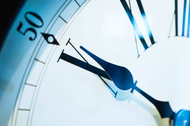 istock Vintage roman clock face close up. Clock hand close up, time concept. 936087684