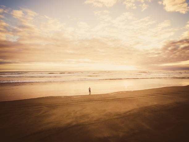 istock Walking on beach concept of hope. 936092768