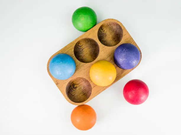 wooden coloured balls scattered