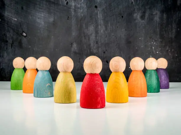 wooden toy peg figures in formation