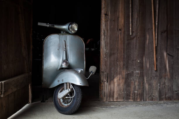 Barn Find Of Old Rusty Italian Scooter In A Hut Photo - Download Image - Moped, Style, Motor Scooter - iStock