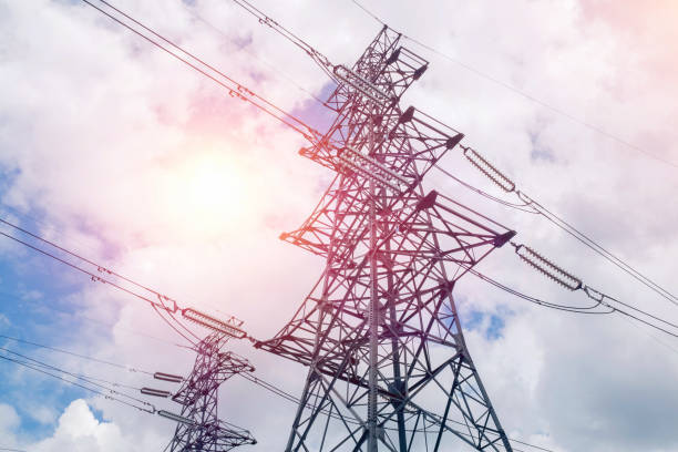 istock Electical Pylons Tower Against Blue Sky 936110750