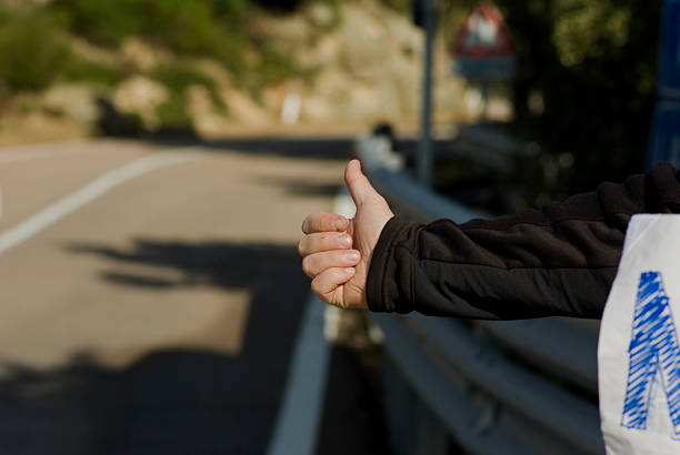 istock Hitchhiking - On the road 93611800