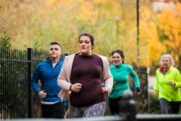 istock Group Of Friends Running Together 936119918