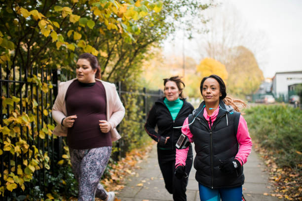 istock Group Of Friends Running Together 936119928