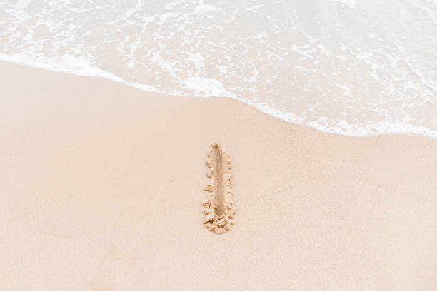 number on the sand beach near the ocean