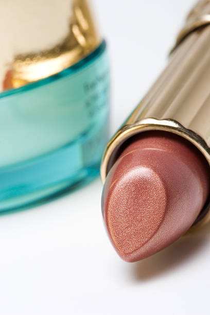 istock Lipstick and jar of face cream 93612115