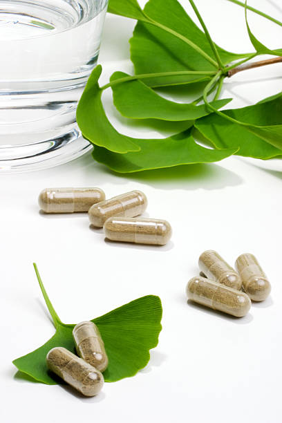 istock Ginkgo biloba capsules on ginkgo leaves 93612349