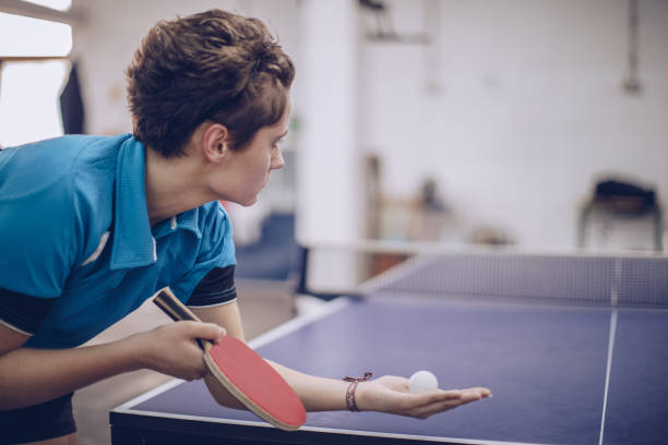 istock Girl training table tennis 936124154