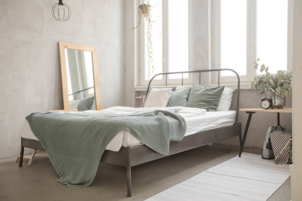 istock Well decorated bedroom morning 936129492