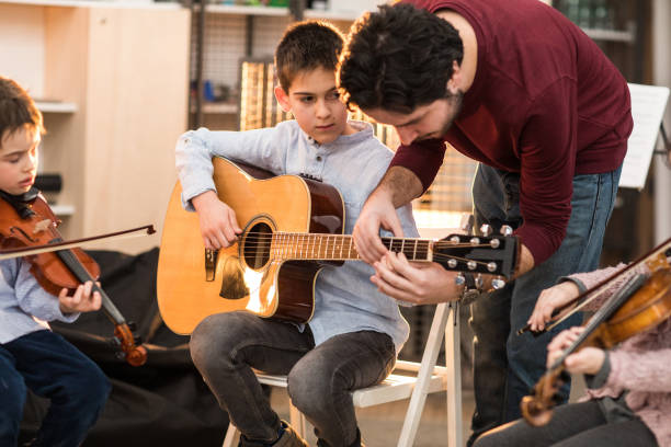 istock Music class is fun with my cool teacher 936130004