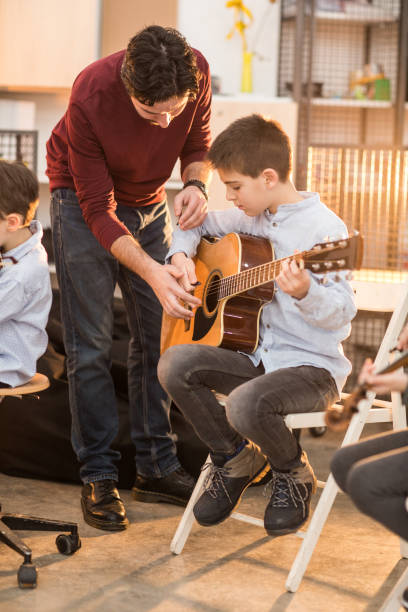 istock Music class is fun with my cool teacher 936132378
