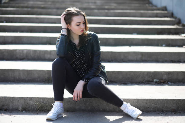 istock Girl on a walk through the spring city 936135738