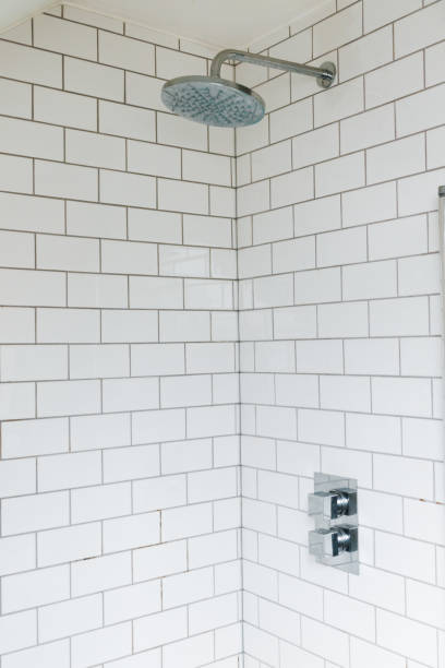 istock Authentic House modern shower bathroom white tiles 936135912