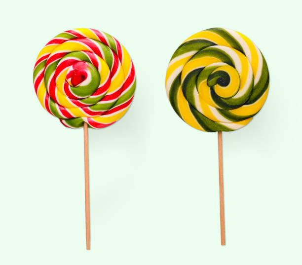 istock Spiral lollipops on white background. Colorful candies, isolated 936136380