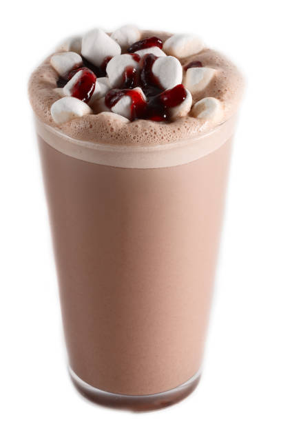 istock cappuccino in a glass with cream. Isolated 936139686