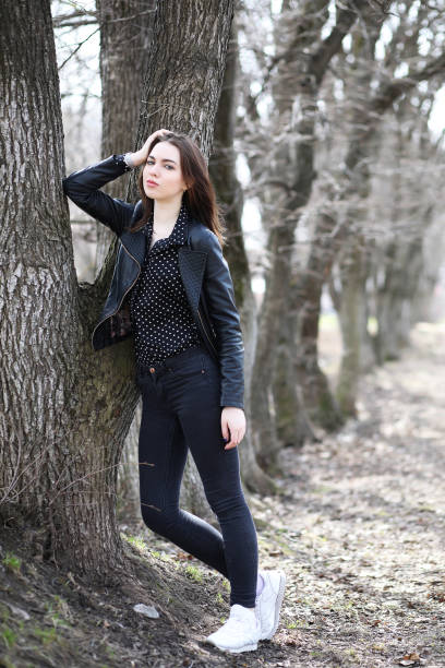 istock Girl on a walk through the spring city 936140162
