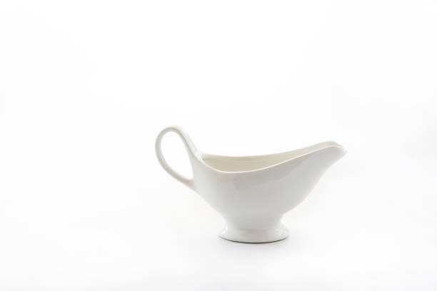 istock white porcelain sauceboat cup isolated on white background 936144268