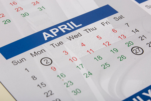 Paper calendar showing the month of April