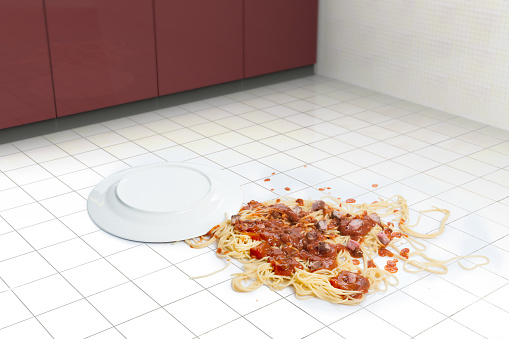 Fallen dish of pasta in a kitchen