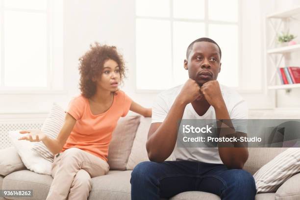 Young Black Couple Quarreling At Home Stock Photo - Download Image Now - Couple - Relationship, Two Parents, Arguing