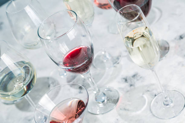 istock Wine tasting concept - glass with different wine on marble background 936148574