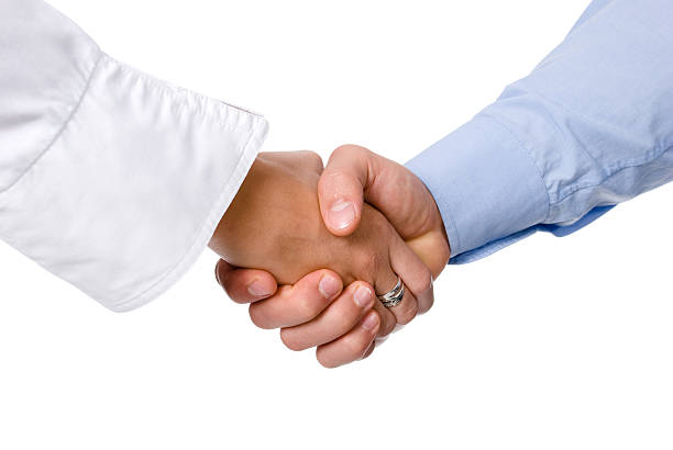 Shaking hands business handshake deal - isolated over a white background georgijevic stock pictures, royalty-free photos & images