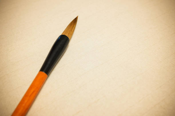 istock Calligraphy brushes on the Chinese art paper 936151564