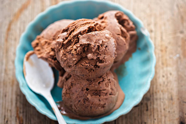 Belgian chocolate ice creams Belgian chocolate ice creams scoop shape photos stock pictures, royalty-free photos & images