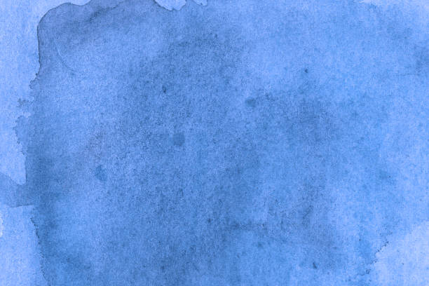 istock Modern light blue watercolor background texture. The paint splashing on the paper. It is a hand drawn. 936156526