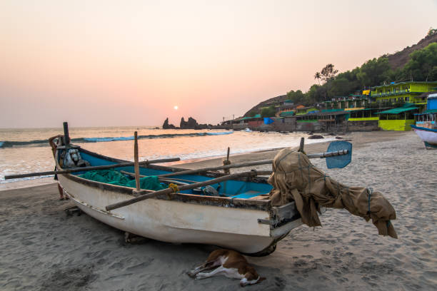 istock fishing boat on tropical beach at sunset 936166218