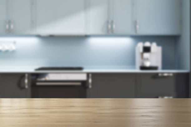 istock Green wall kitchen, black countertops blur 936171030