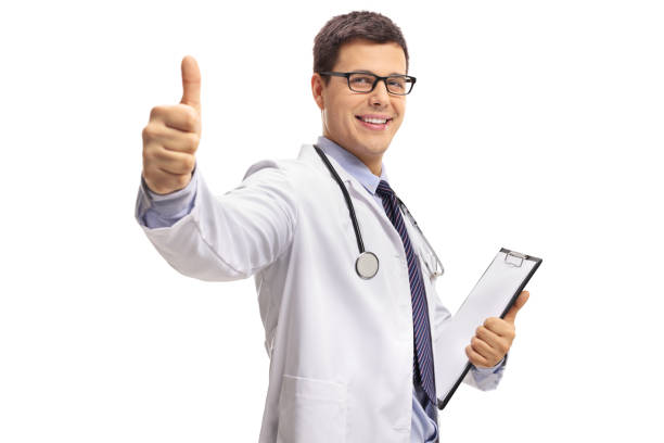 istock Doctor with a clipboard making a thumb up gesture 936177378