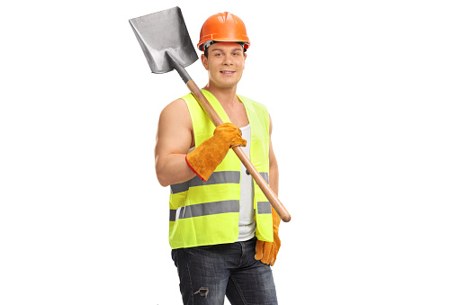 Construction worker with a shovel isolated on white background