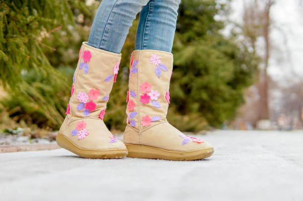 istock Woman legs in winter boots 936182642