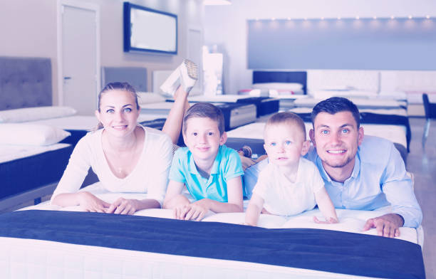 istock Visitors are testing quality of mattress 936183118