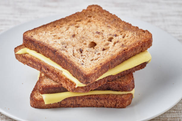 istock Grilled sandwich with cheese on a plate. 936193962