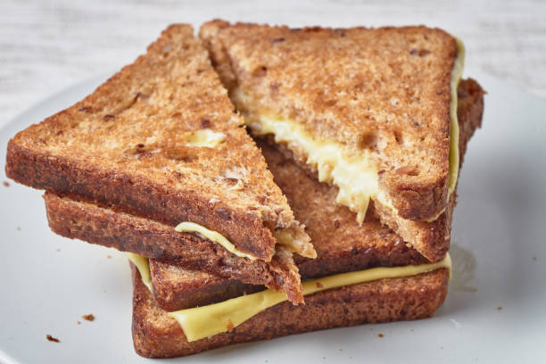 istock Grilled sandwich with cheese on a plate. 936193990