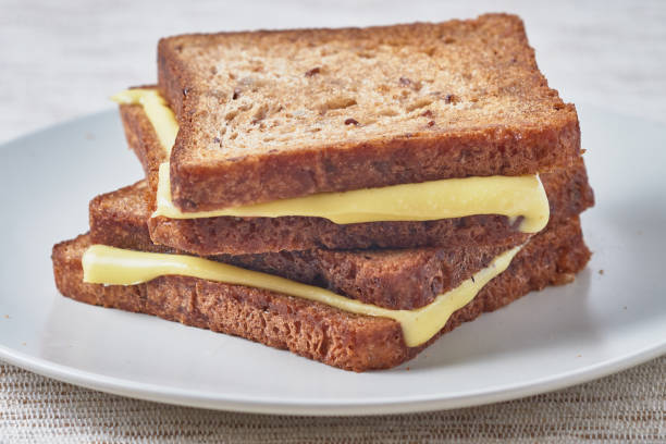 istock Grilled sandwich with cheese on a plate. 936193994