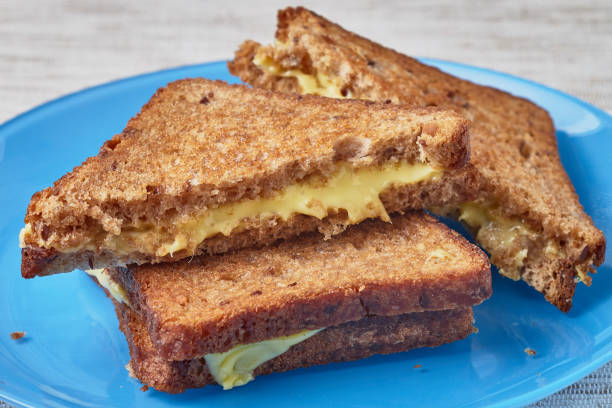 istock Grilled sandwich with cheese on a plate. 936194022