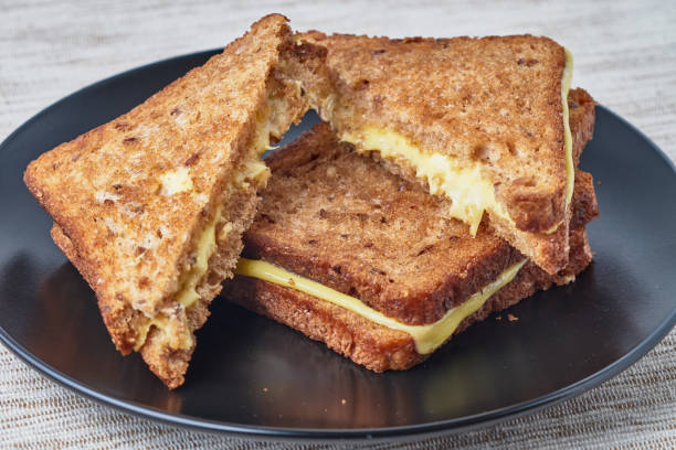 istock Grilled sandwich with cheese on a plate. 936194040