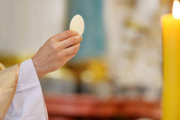 istock Priest celebrate mass at the church 936194182
