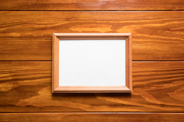 istock wooden frame for photos or text with a blank space 936211528