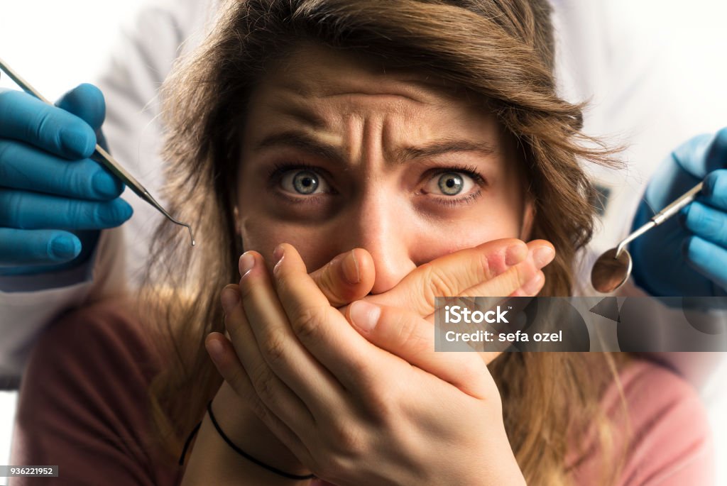 Scared Patient and Dentist Dentist, Patient, Young Girl, Anxiety, Fear Dentist Stock Photo