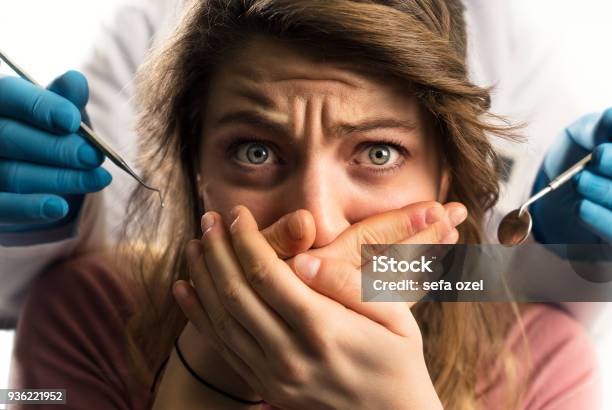 Scared Patient And Dentist Stock Photo - Download Image Now - Dentist, Dental Health, Fear